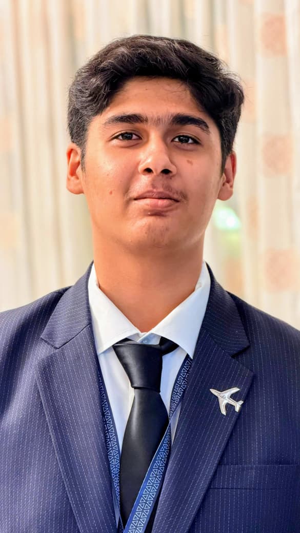 Muhammad Subhan in a suit and tie